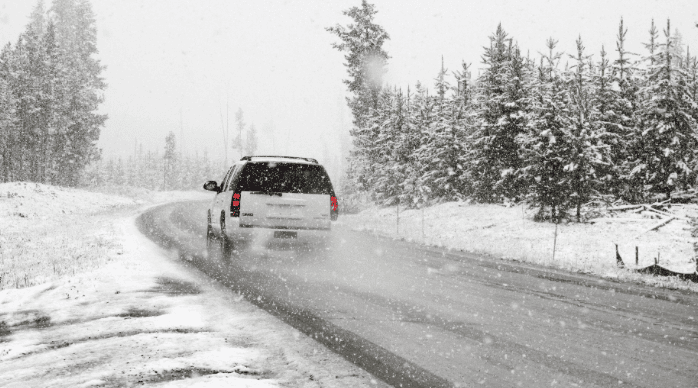 vehicle driving in snowy conditions